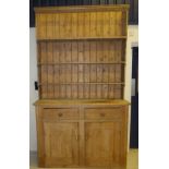 A large pine dresser,