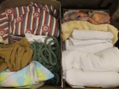 A box containing assorted textiles to include two pairs of cotton lined curtains, the red,