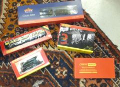 A box containing various toy locos and carriages etc to include a Bachmann Branch-Line Model