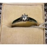 An 18 carat gold solitaire diamond ring