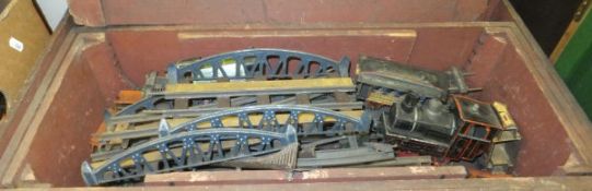 A Hornby 0 gauge clockwork train set with two locomotives, figures, church, bench seats,