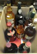 A mixed lot of various wines and spirits including Blandy's Madeira, Akvavit, Drambuie,