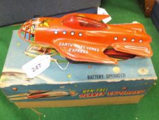 An SS Eagle Dan Dare Earth Mars Venus Express clockwork spaceship toy, tin plate with transfer