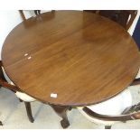 An Edwardian mahogany extending D end dining table with two extra leaves,