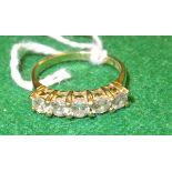 An 18 carat gold mounted five stone diamond ring, approx 0.