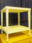 A white painted two tier trolley, with blue highlights,