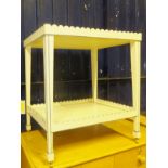 A white painted two tier trolley, with blue highlights,