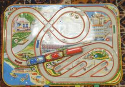 A German clockwork toy car game with printed topographical scenes, two cars and one bus,