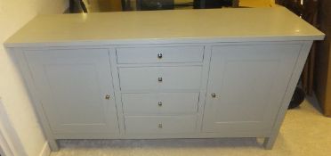 A Willis & Gambier grey painted sideboard of four drawers and two cupboard doors on square section