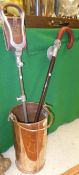 A copper cylindrical bucket with handle,
