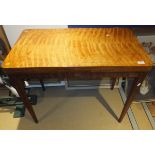 A 19th Century mahogany and inlaid foldover card table on square tapered legs