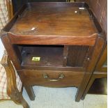 A 19th Century mahogany tray top night table with tambour front over a pull-out drawer