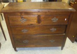 A Victorian pine hanging wall cupboard with single door and a Edwardian oak chest of drawers