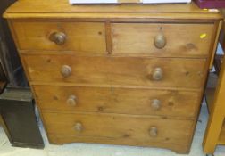 A pine chest of two short and three long drawers on bracket feet