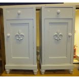 Two grey painted and marble top pot cupboards with fleur de lys applied mouldings to doors,