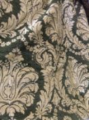 A pair of chenille interlined curtains with gold acanthus and swag style decoration on a green