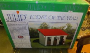 A large quantity of various equestrian toys including Schleich Horse Stable,