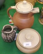A Simon Eeles Shepherds Well Pottery glazed stoneware cream jug, a Tenmoku lidded brown stoneware