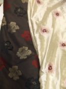 An interlined door curtain, the brown ground decorated with red, black and tan flowers,