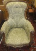 A Victorian rosewood framed button back salon chair