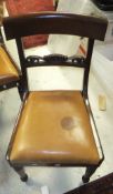 A set of six mahogany William IV style chairs with light orange leatherette upholstered seats