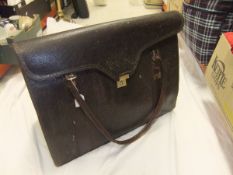 A snakeskin and leather large handbag