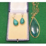 A 20th Century 9 carat gold mounted malachite teardrop shaped pendant with rope-twist surround,