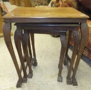 A nest of three early to mid 20th Century Eastern hardwood occasional tables,