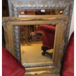 A painted floral framed rectangular wall mirror,