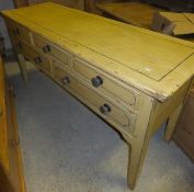 A 19th Century painted pine bank of five drawers on square tapered legs