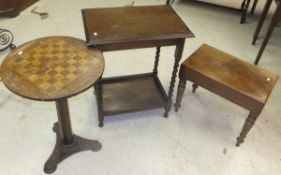 An early 20th Century mahogany drop leaf dining table, on claw and ball feet,