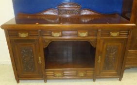 A Victorian mahogany sideboard of three drawers over two cupboard doors and an open recess,
