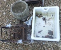 A cast iron fire basket, a Belfast sink,