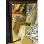 A mahogany framed rectangular wall mirror,