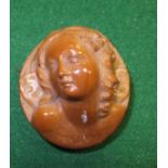 A Taguenut cameo of an angel's head