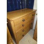 A Victorian pine chest of two short and three long drawers, the top with rounded corners,