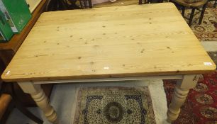 A modern pine farmhouse style kitchen table