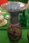 A Chinese cloisonné vase with ovoid body decorated with flowers and trumpet shaped neck  CONDITION