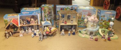 A collection of Sylvanian Families toys including St.