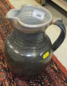 A Ray Finch jug of ribbed form in blue/brown glaze CONDITION REPORTS 25 cm high