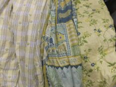 A pair of Jane Churchill "Tulip Check" cotton interlined curtains and matching pelmet,