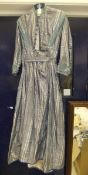 A Victorian blue and white checked silk dress with blue and green trim