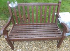 A hardwood garden two-seater bench