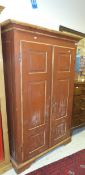 A Continental painted pine two door cupboard of four shelves CONDITION REPORTS Approx 112 x 184cm