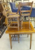 An oak draw leaf dining table on square sectioned tapering legs, four assorted chairs,