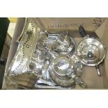 A box of assorted plated wares to include a swing handle basket, two teapots, etc.