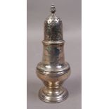 A SILVER PEPPERETTE of baluster outline,