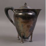 AN ARTS AND CRAFTS SILVER HOT WATER JUG,