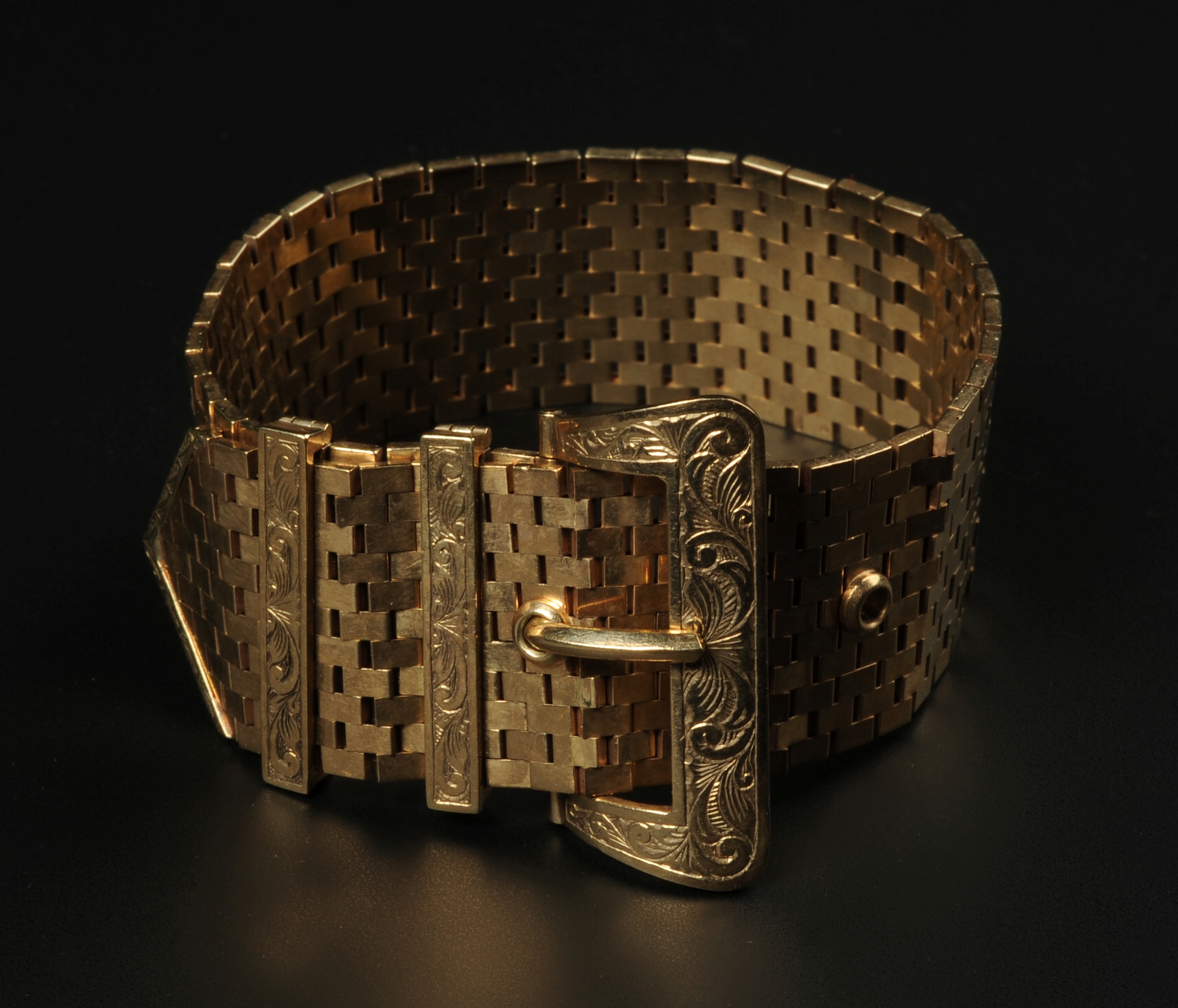 A 'BELT' BRACELET c.1960 of brick link a