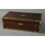 A MID VICTORIAN BRASS BOUND ROSEWOOD WRI